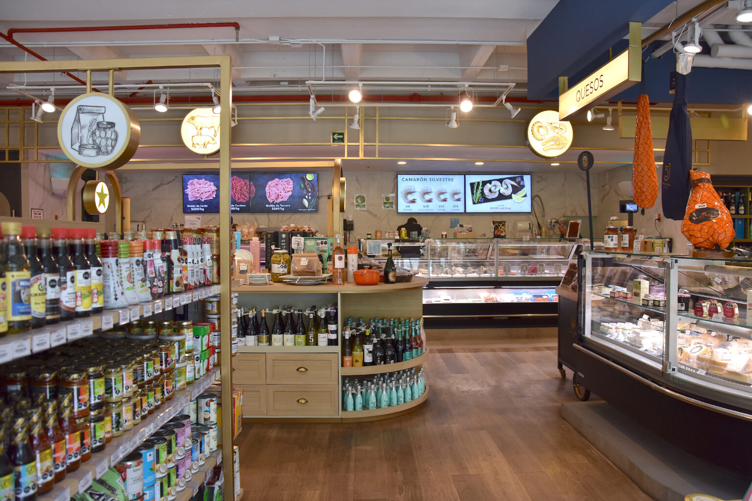 Vista interior de las áreas de quesos y pescadería en Ingredienta Polanco